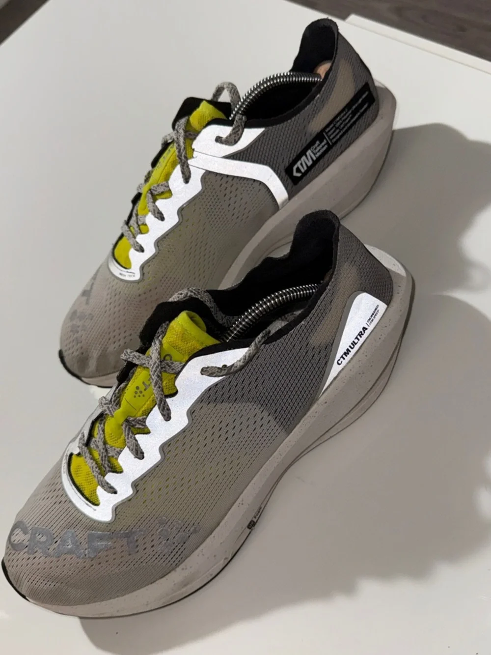 Craft Lightweight Neutral Gray Running Shoes with Bright Yellow Accents